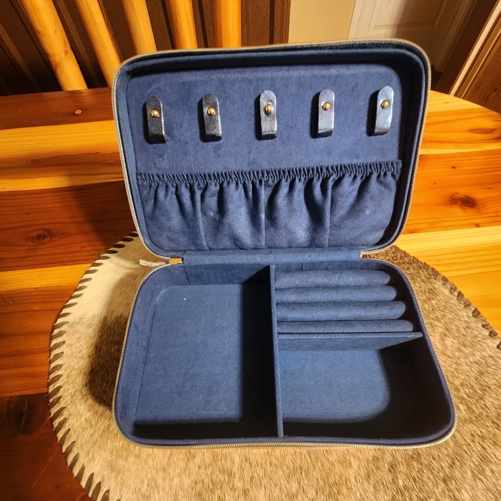 Jewelry Box, 5" x 8" x3". Two zip compartments